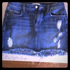 Destroyed denim skirt